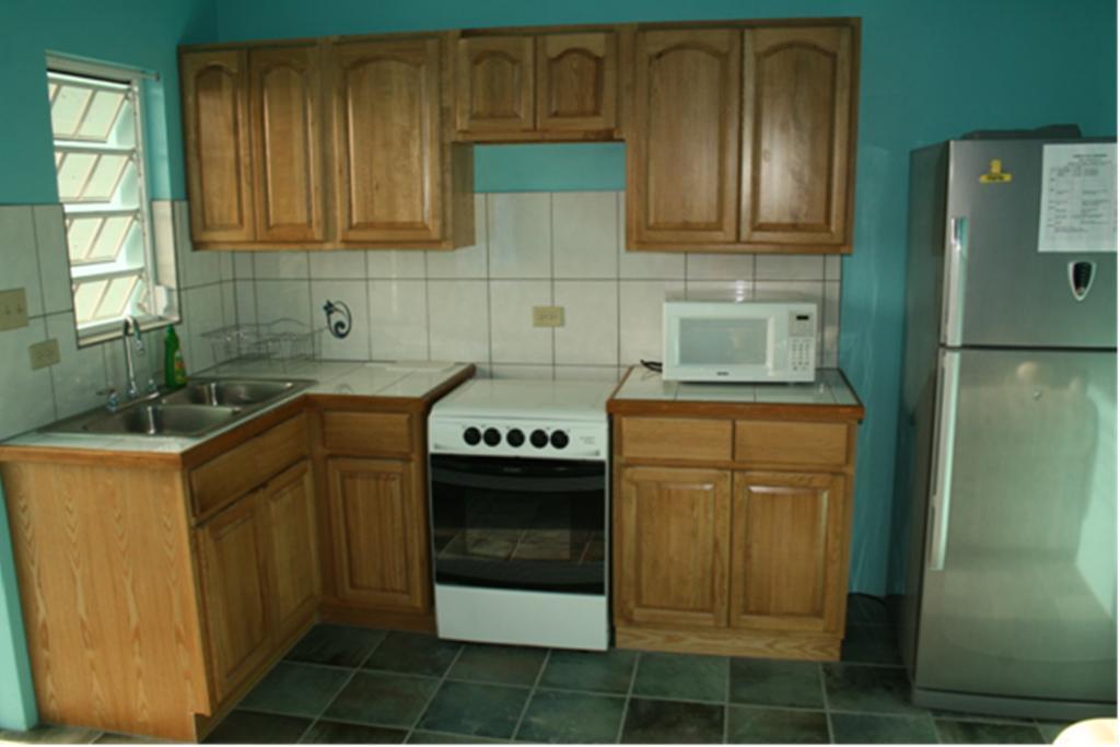 Lamblion Holiday Apartment Freemans Szoba fotó